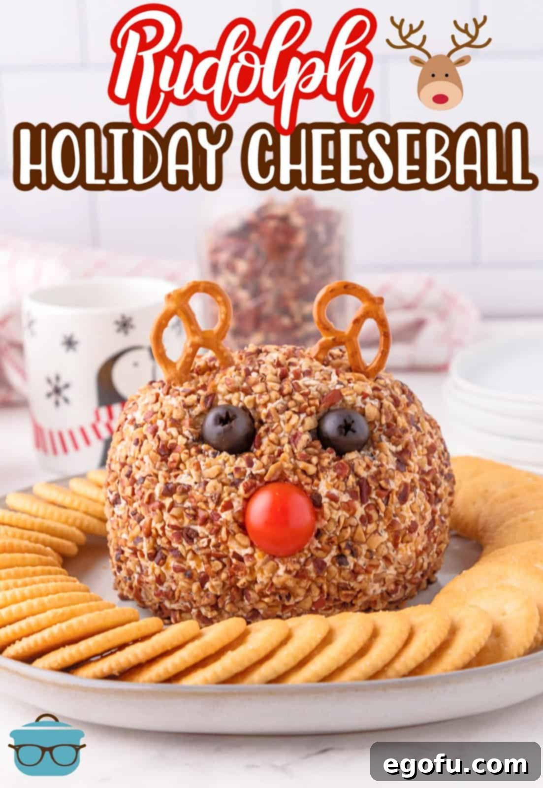 Pinterest image of finished Rudolph Cheeseball on platter with crackers, garnished for holiday entertaining.
