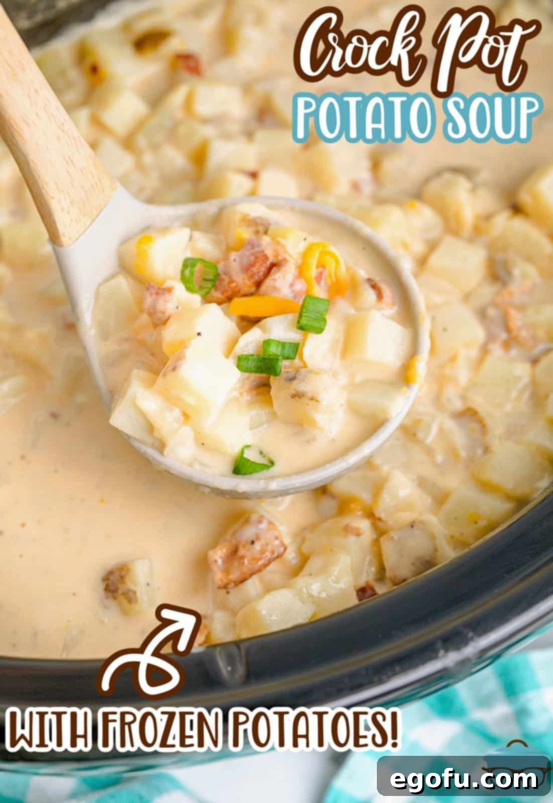 Effortless Slow Cooker Potato Soup with Frozen Potatoes 4 A large spoon scooping up steaming, rich potato soup from a slow cooker, highlighting its thick and creamy texture.