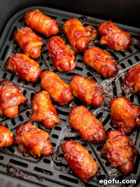 fully cooked bacon wrapped sausages in air fryer.