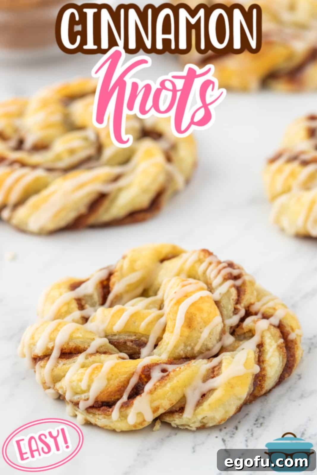 cinnamon knots shown spread out on a marble surface. 