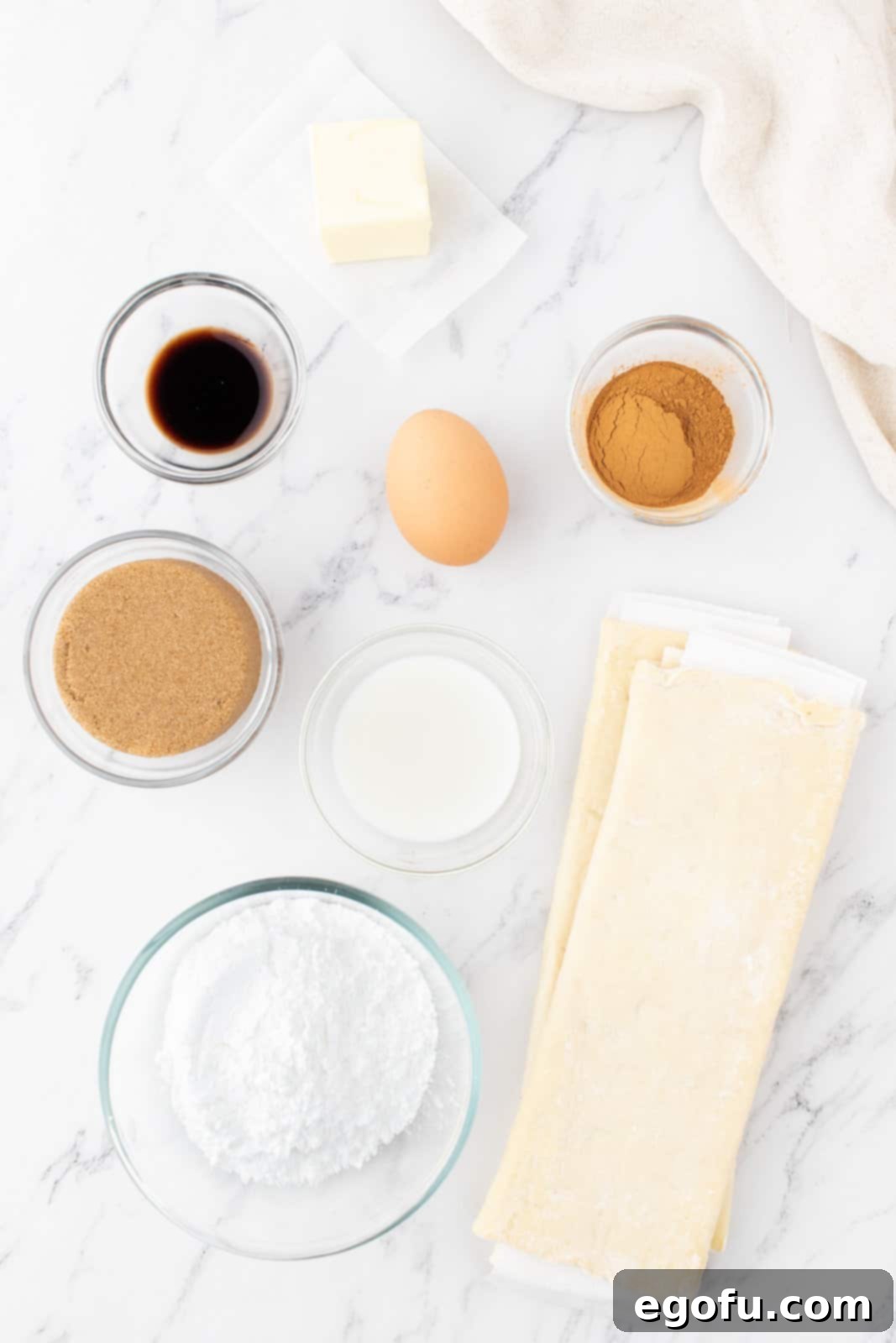 puff pastry, cinnamon, brown sugar, vanilla extract, powdered sugar and milk.