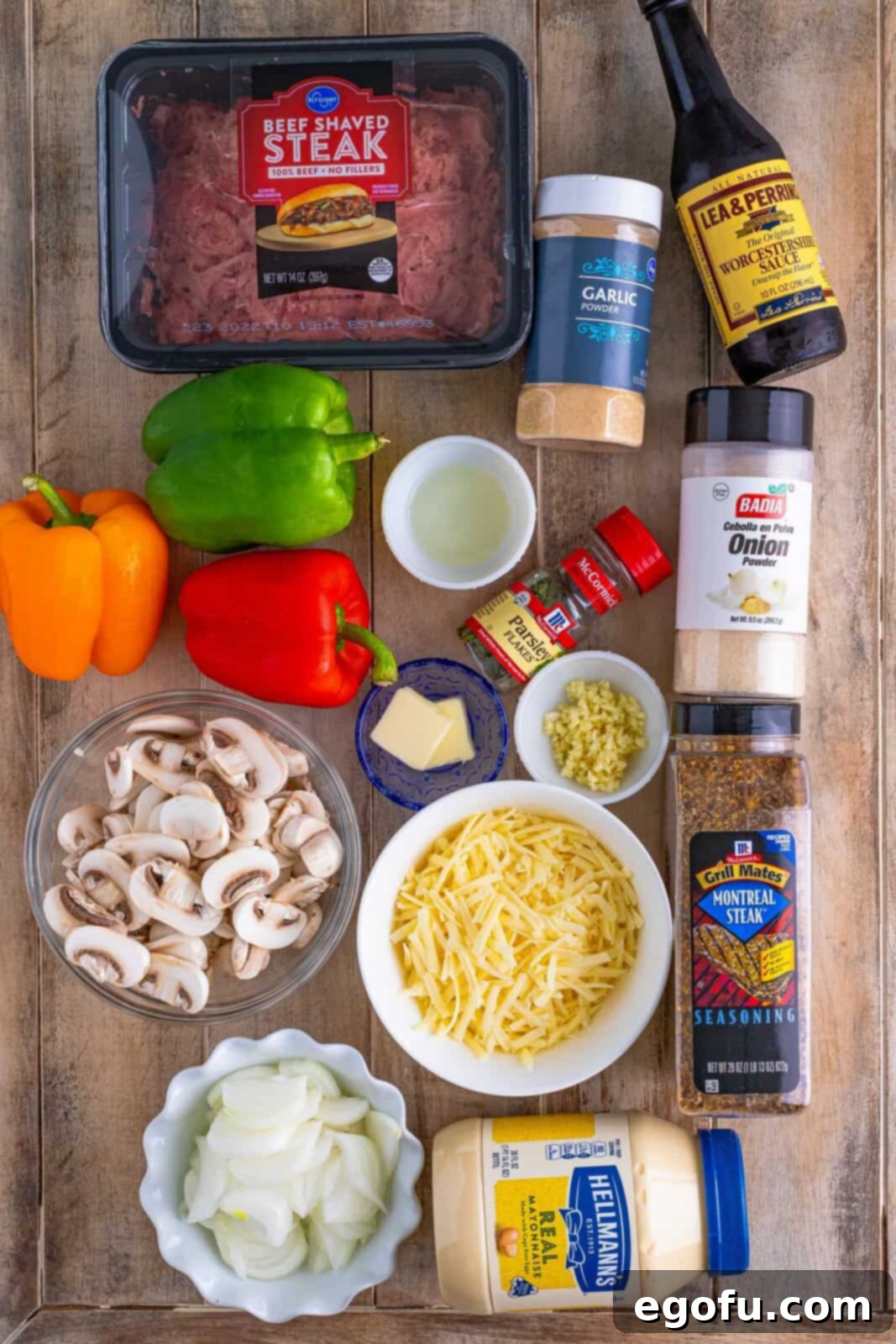 Philly Cheesesteak Pepper Boats 4 bell peppers, shaved steak, Worcestershire sauce, onion powder, garlic powder, mushrooms, garlic, onion, mayonnaise and provolone cheese.