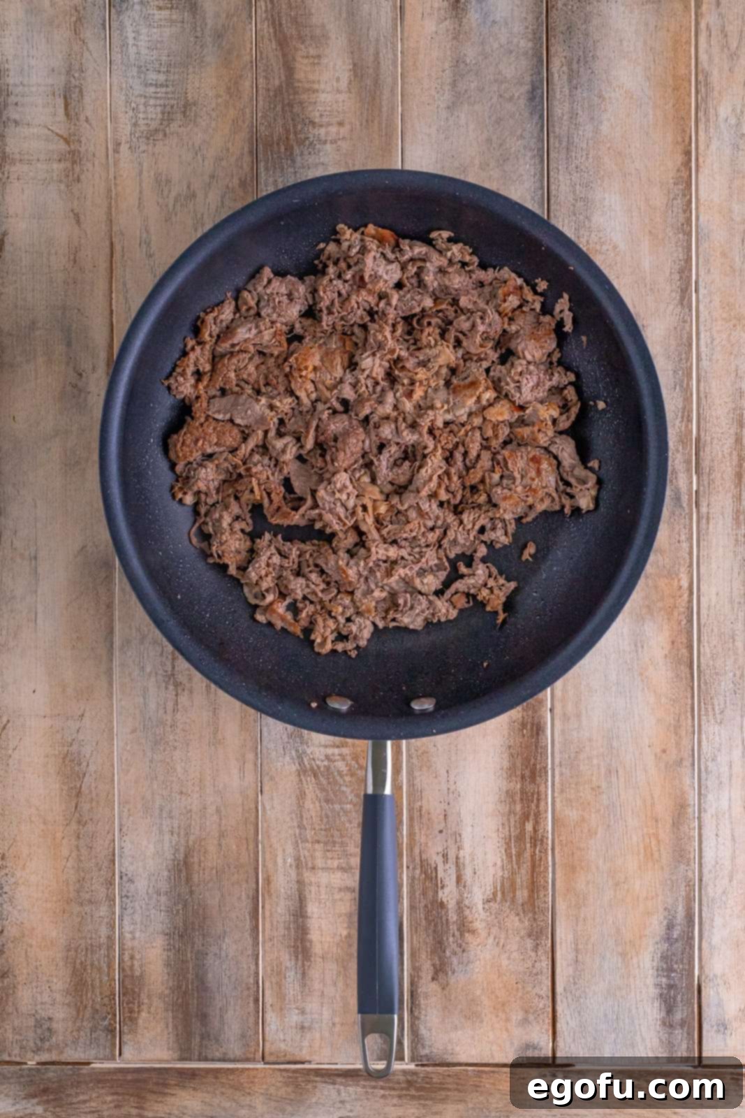 Philly Cheesesteak Pepper Boats 6 shaved steak cooked and browned in a skillet.