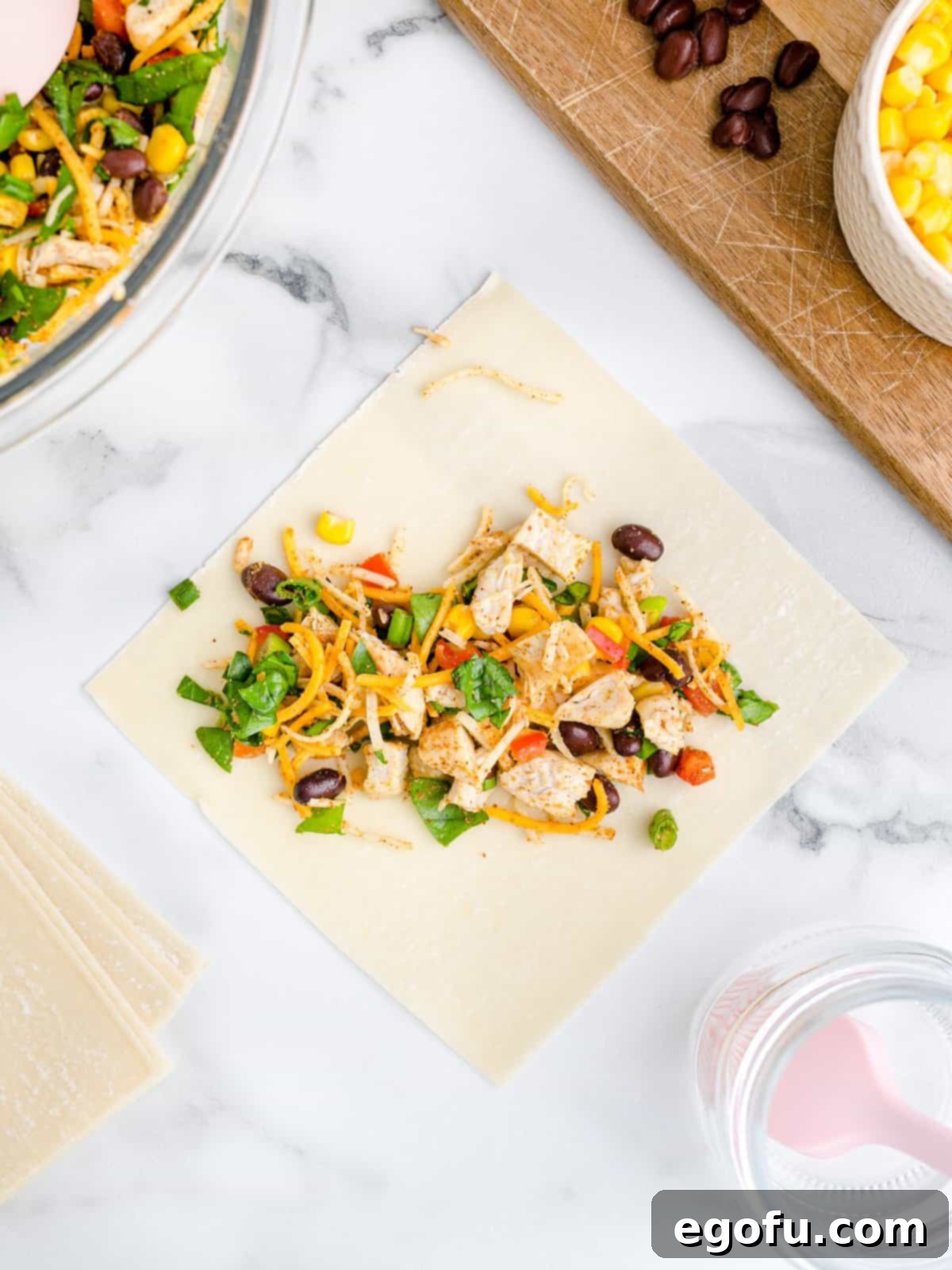 An egg roll wrapper with the filling.