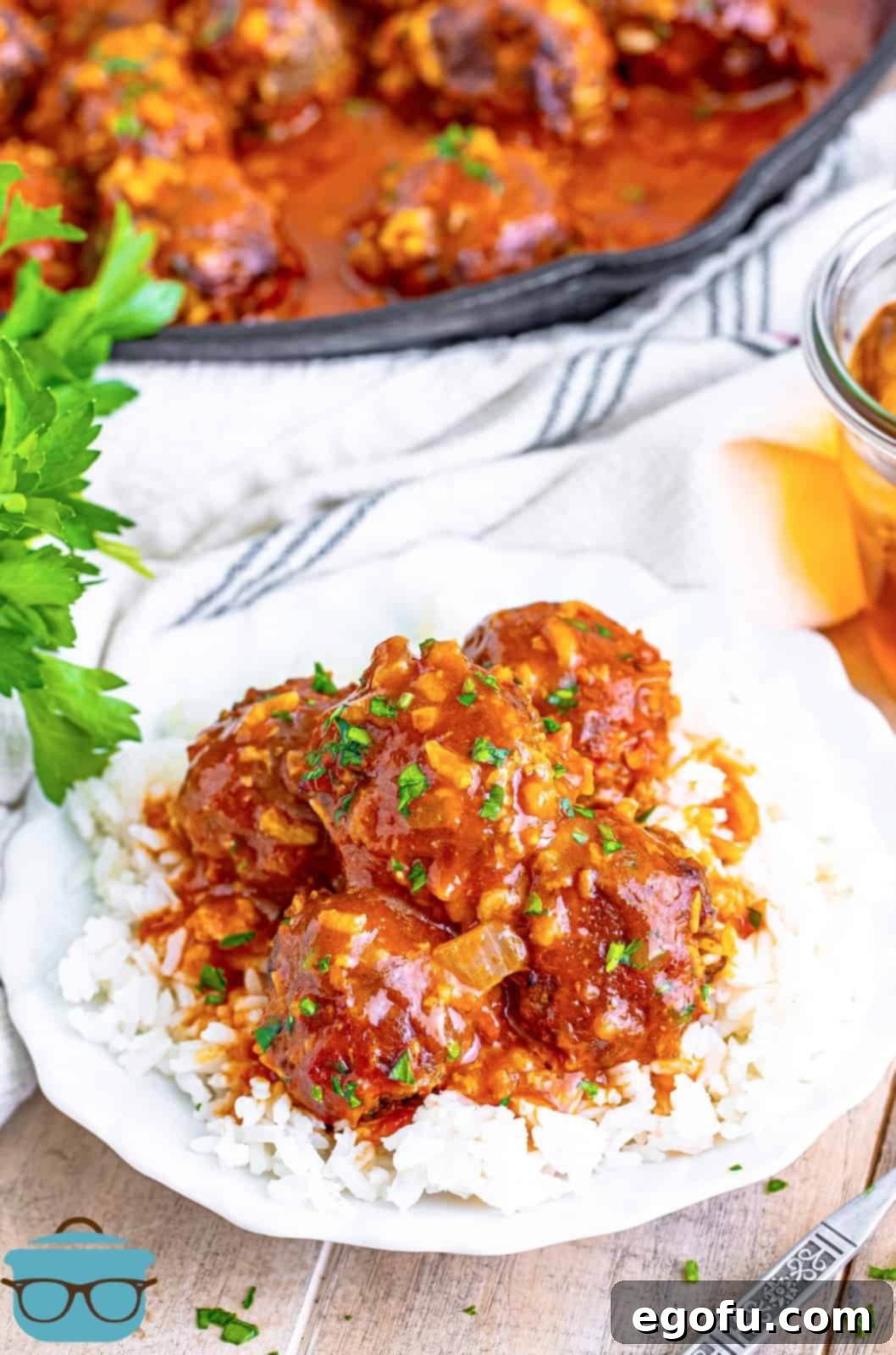 A plate of white rice and perfectly cooked porcupine meatballs, ready to be enjoyed.