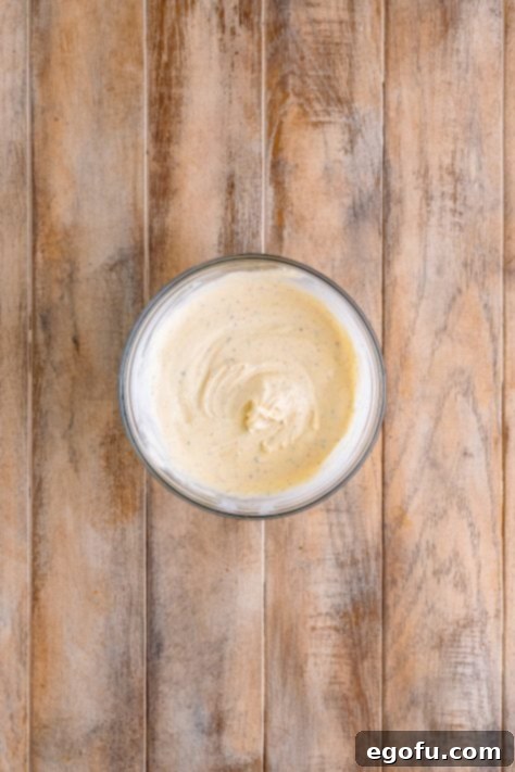 Ruby Tuesday Inspired Creamy Pasta Salad 12 A glass bowl of pasta salad sauce.