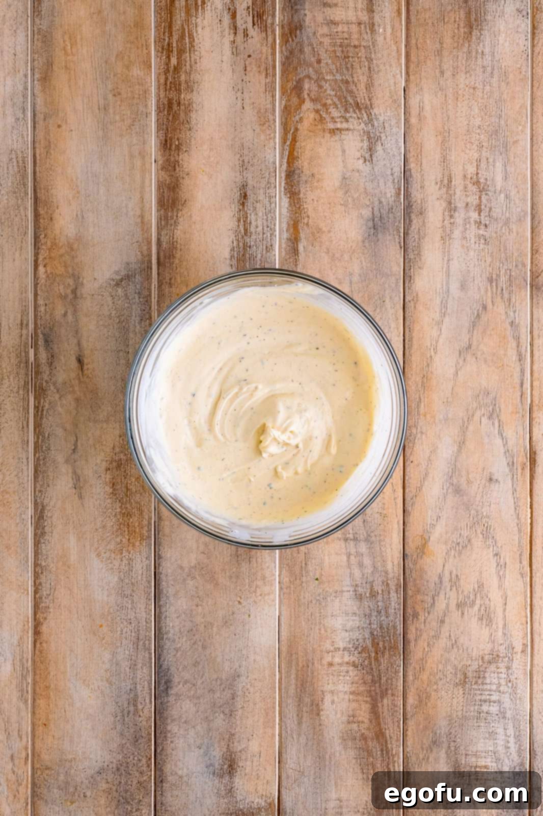 Ruby Tuesday Inspired Creamy Pasta Salad 6 A glass bowl of pasta salad sauce.