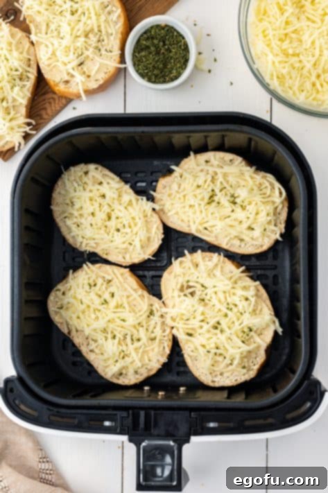 four pieces of garlic cheese bread in the air fryer.
