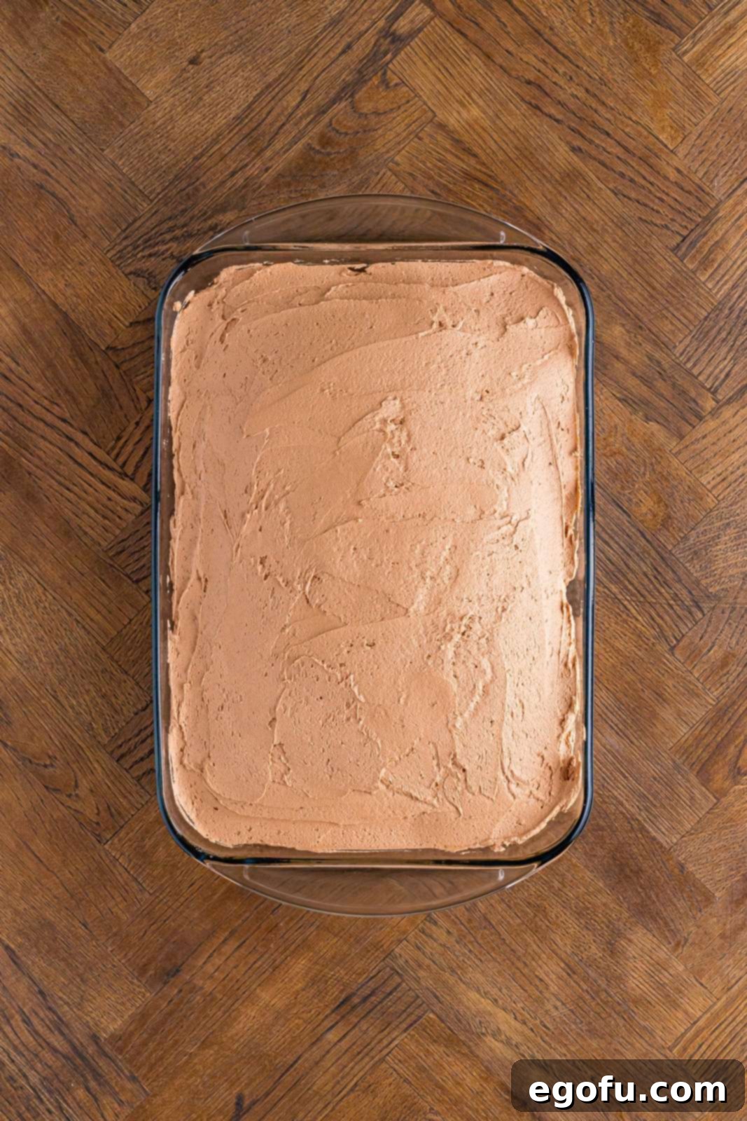 A chocolate cake with chocolate frosting. 