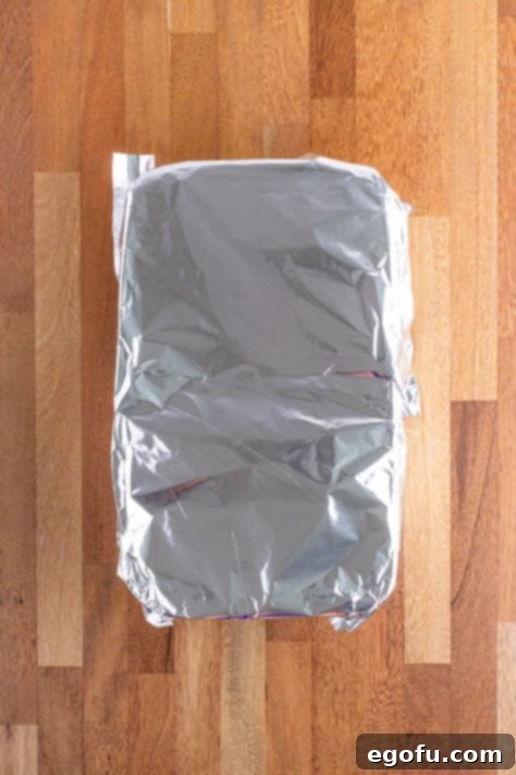 Aluminum foil on top of a baking dish.