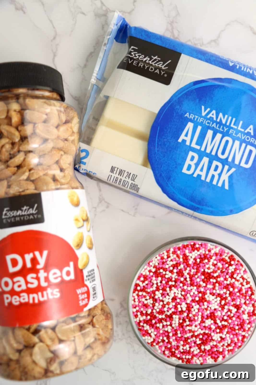 Effortless Slow Cooker Candies 4 A bag of almond bark, dry roasted peanuts, and sprinkles.