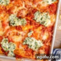 A close up looking at some homemade lasagna on a baking sheet.