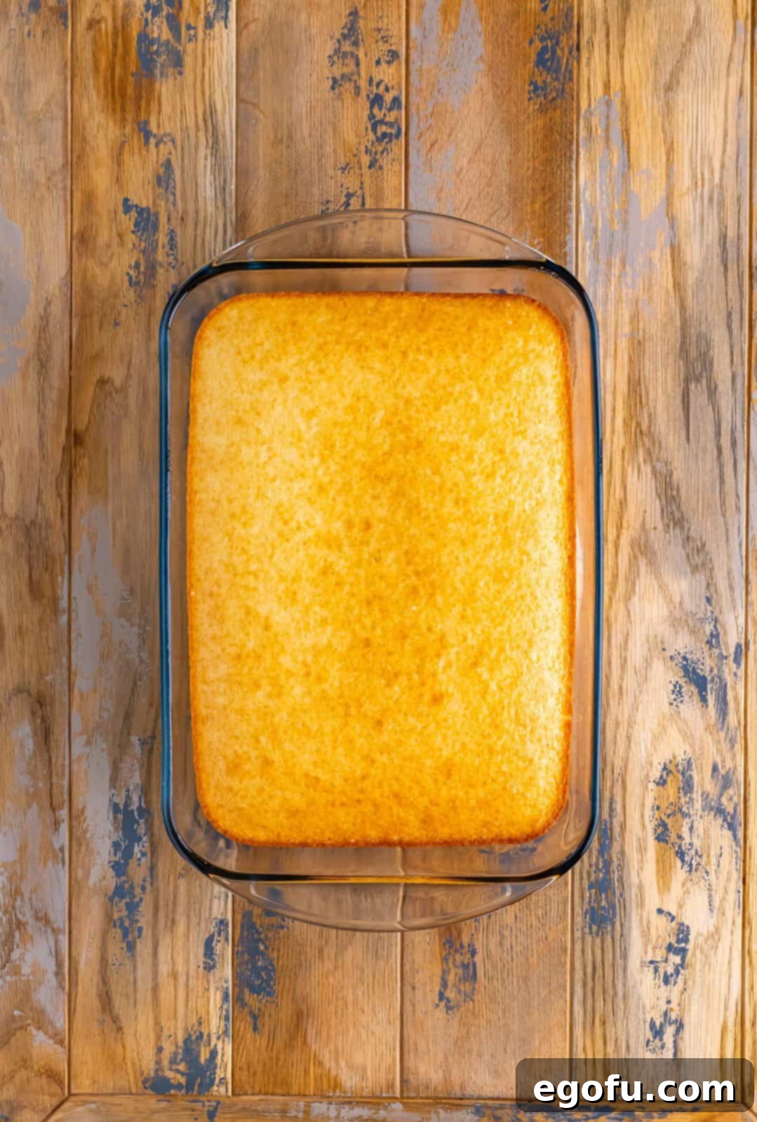 A baked cake in a baking dish.