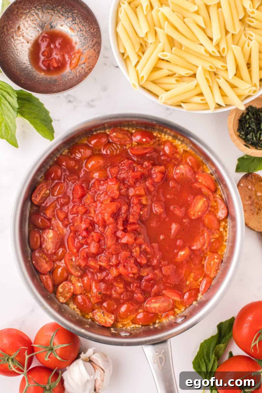 Penne with Garden Tomato Sauce 8 Diced tomatoes on top of cherry tomatoes.