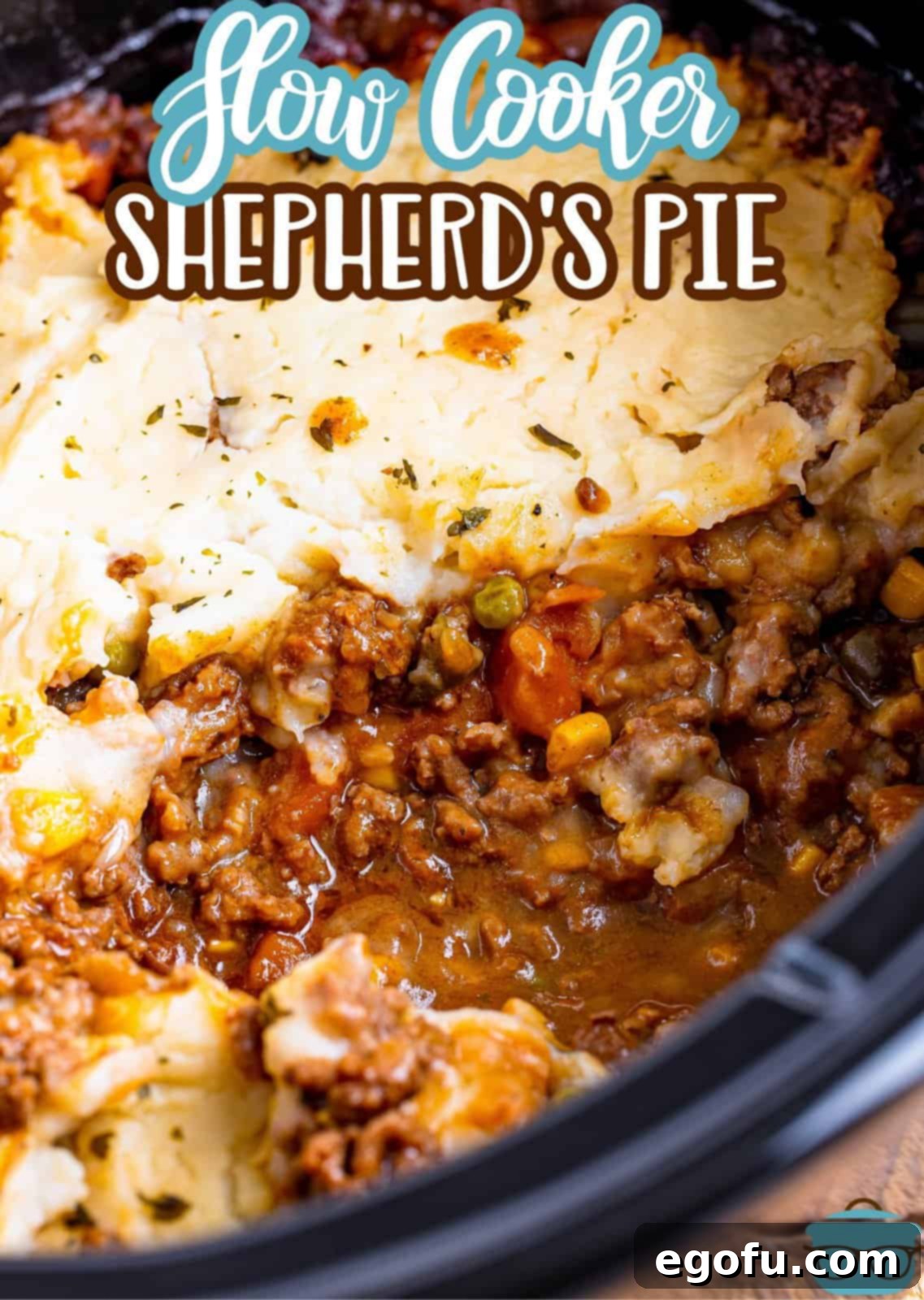 Comforting Slow Cooker Shepherd's Pie 3 Looking down on a slow cooker with shepherd's pie.