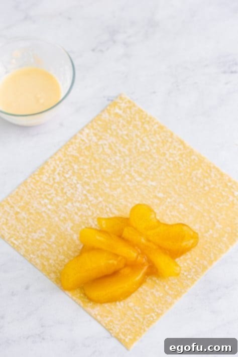 Egg roll wrappers with apple pie filling.