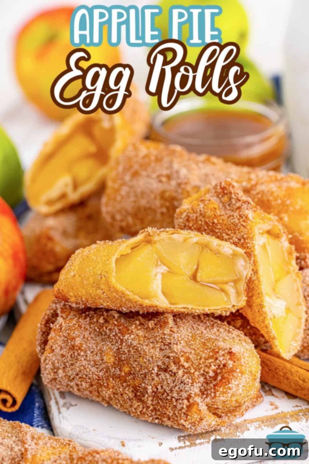 A stack of Apple Pie Egg Rolls with one broke open.