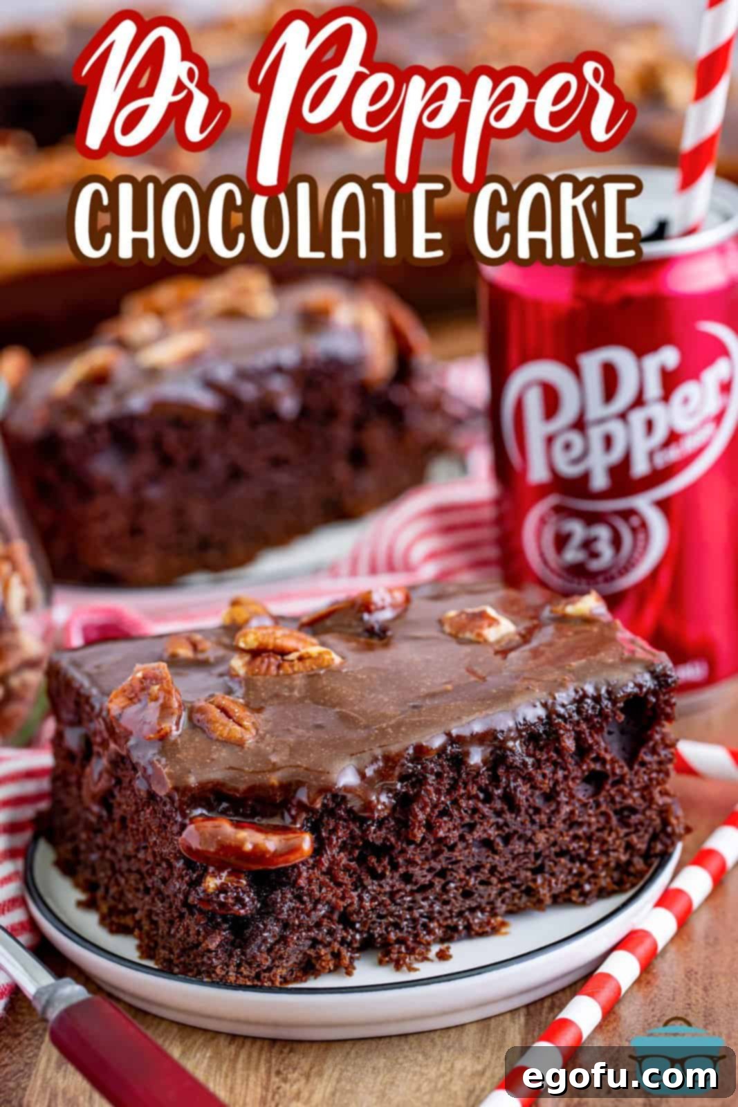 A perfectly frosted slice of Dr Pepper cake on a white plate, ready to be enjoyed.