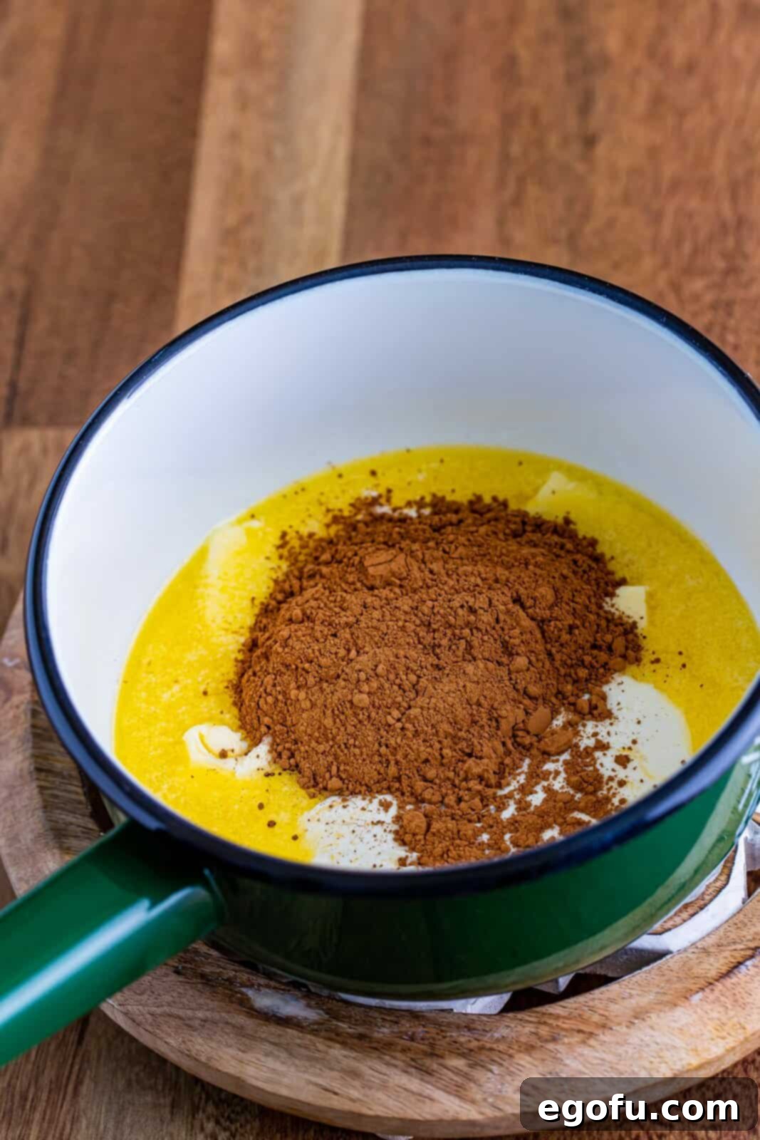 Melted butter in a saucepan, ready for the next ingredients.