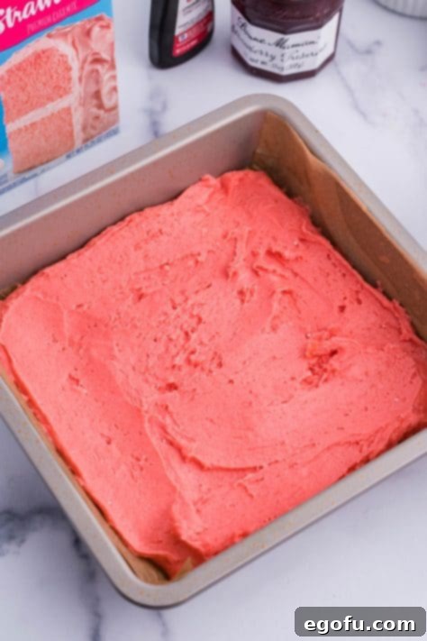 Strawberry Swirl Brownie Bliss 12 A brownie pan with Strawberry batter in it.