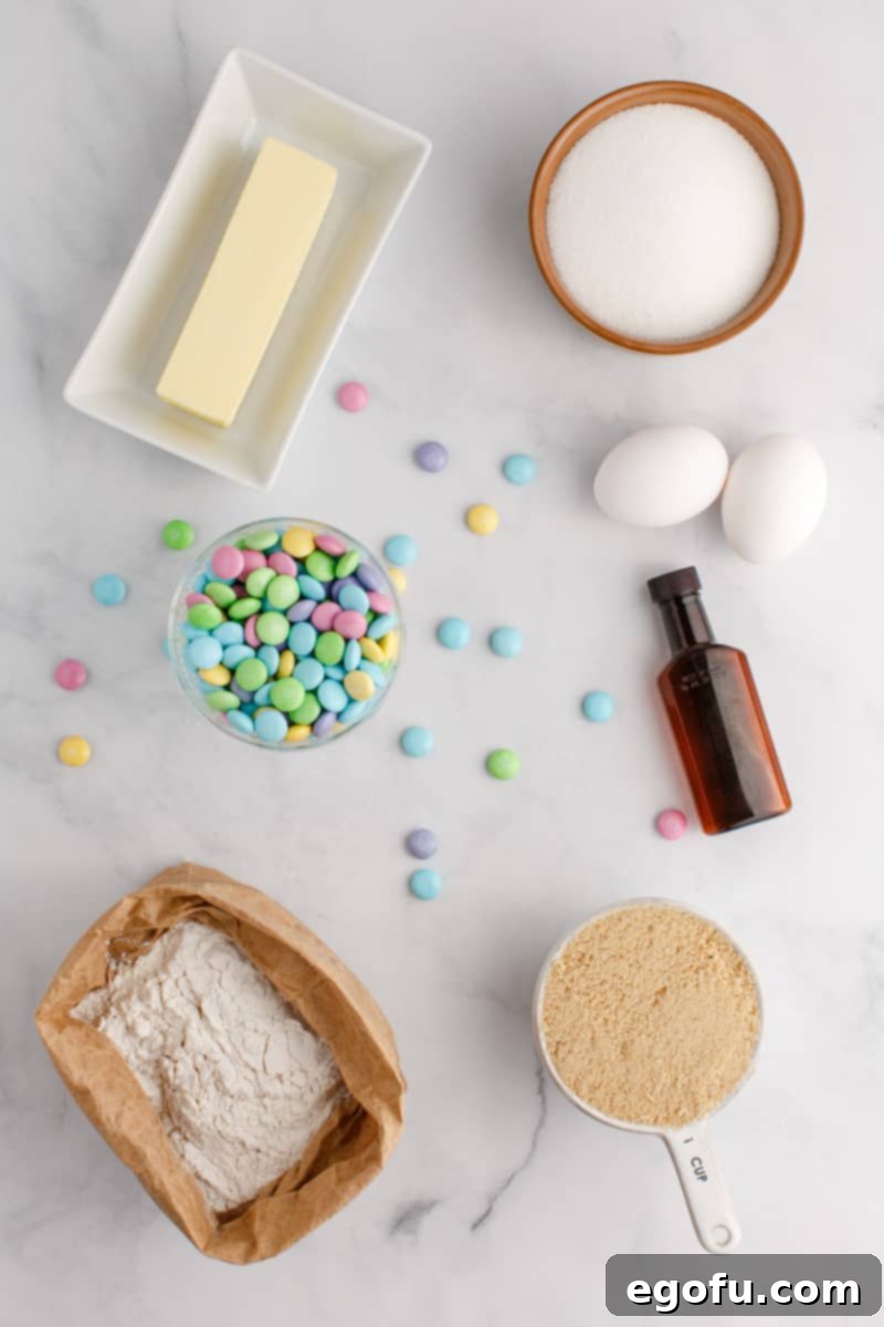 Vanilla extract, butter, brown sugar, egg, M&M's, sugar, and all purpose flour.