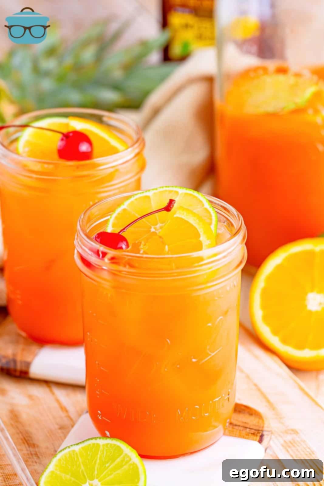 Island Dream Sip 2 A few jars of homemade Rum Punch, ready to serve at a party.