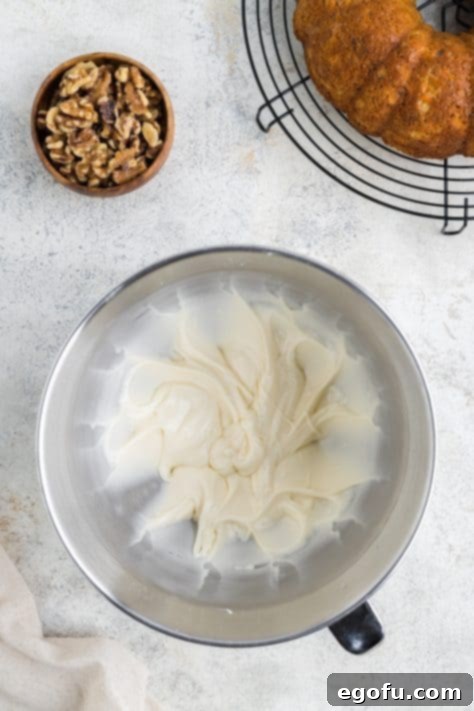 A carrot bundt cake glaze in a bowl.