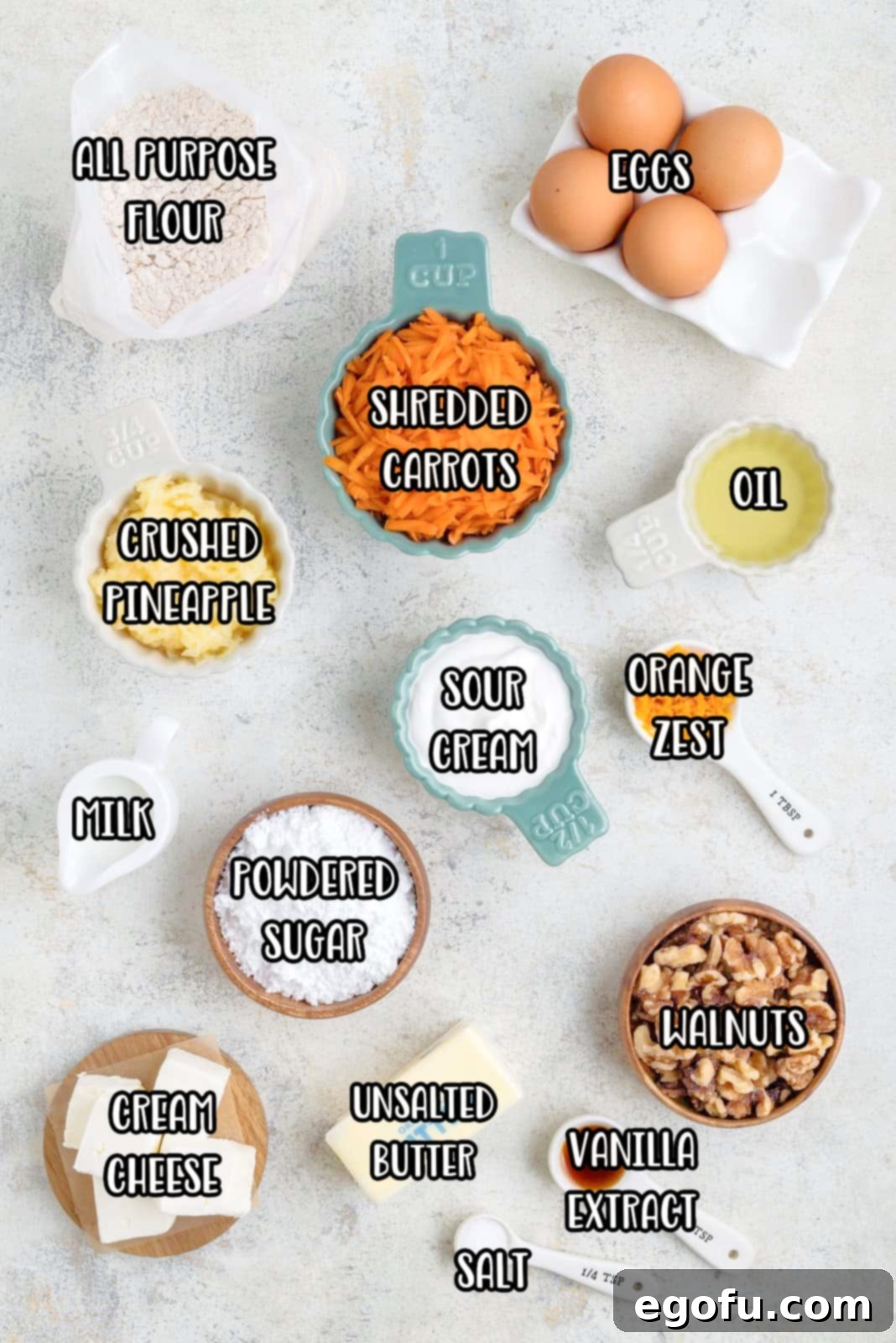 Spice cake mix, shredded carrots,eggs, canola oil, sour cream, cream cheese, orange zest, pineapple, walnuts, unsalted butter, powdered sugar, vanilla extract, kosher salt, and whole milk.