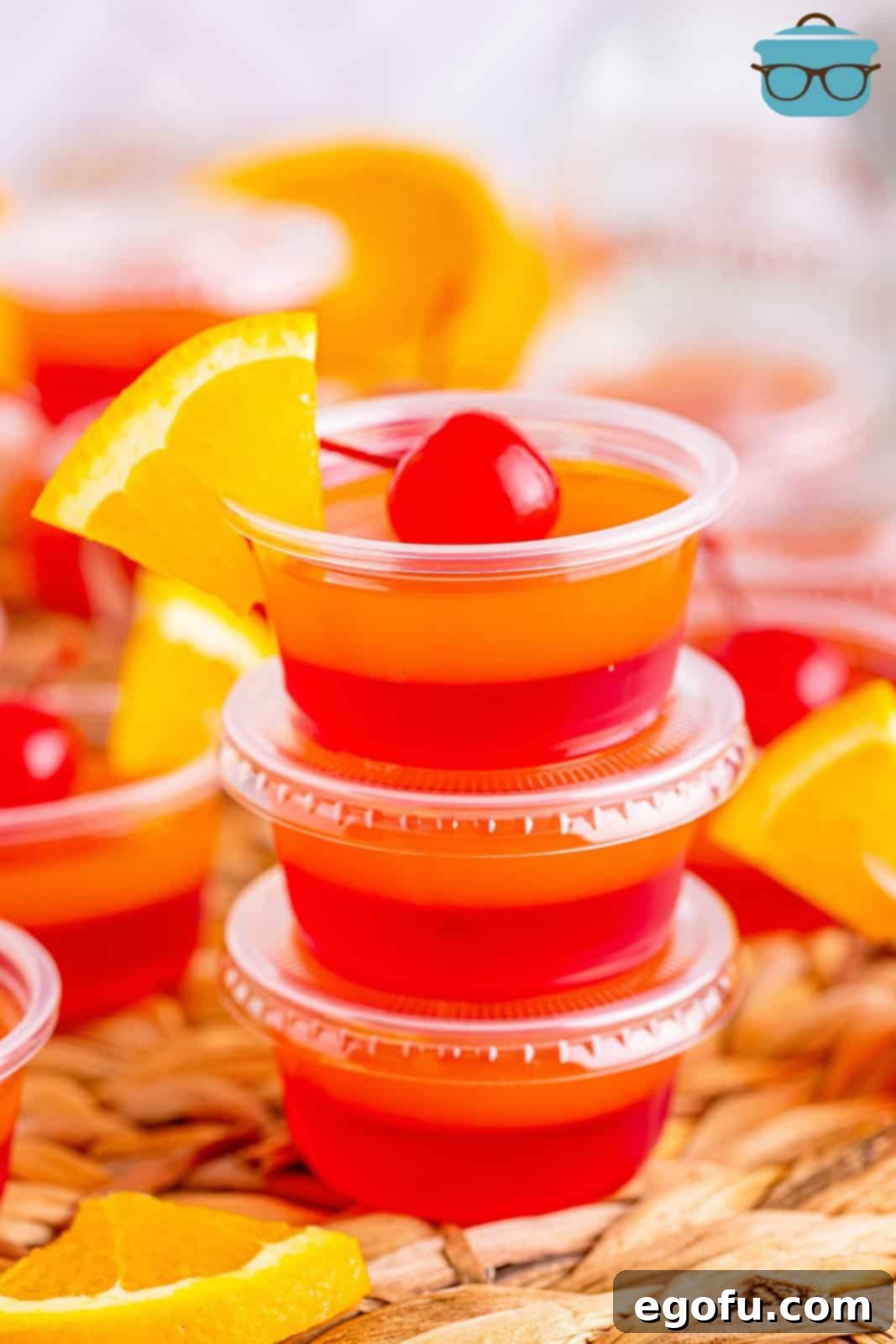 Agave Aurora Shots 9 A triple stack of homemade Tequila Sunrise Jello Shots.