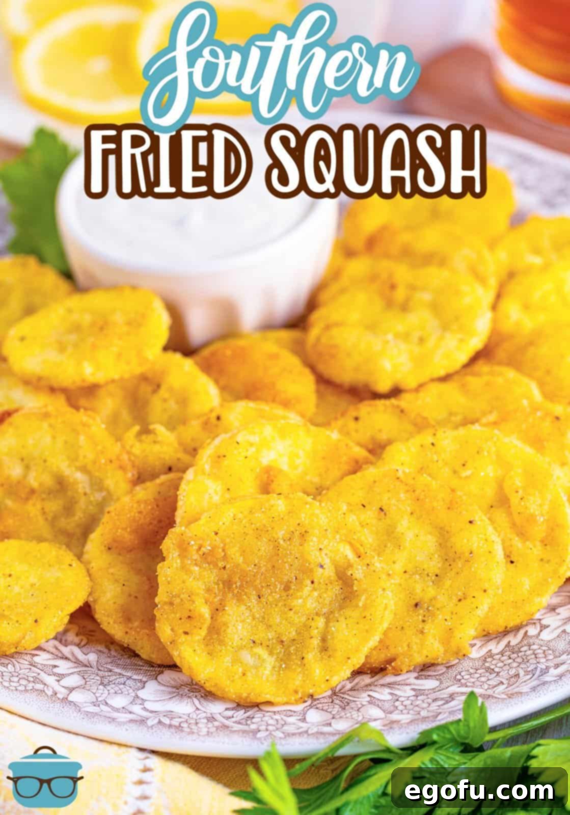 Down Home Fried Squash 4 A plate filled with golden-brown fried squash pieces, perfectly cooked.