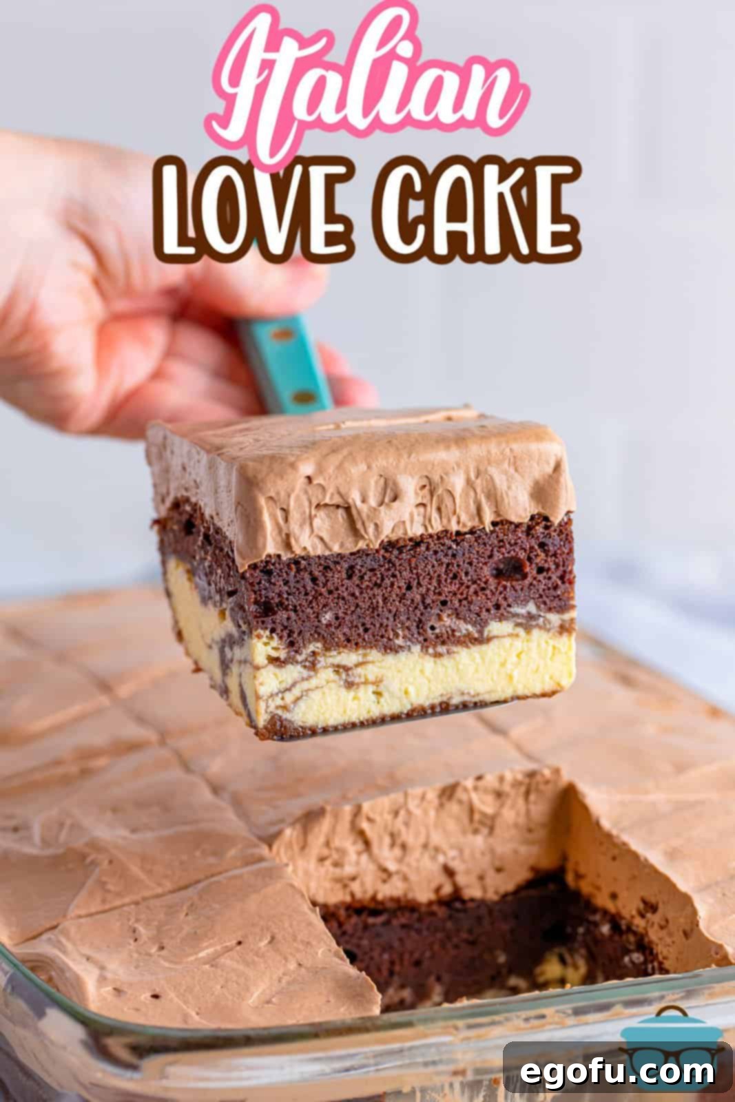 Amore Italian Dream Cake 3 A large pan of Italian Love Cake, with one slice already removed, highlighting its generous size and inviting appearance, ready to be shared.