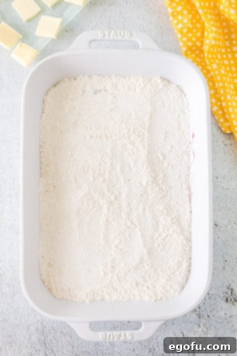 cake mix sprinkled on top of pie filling.