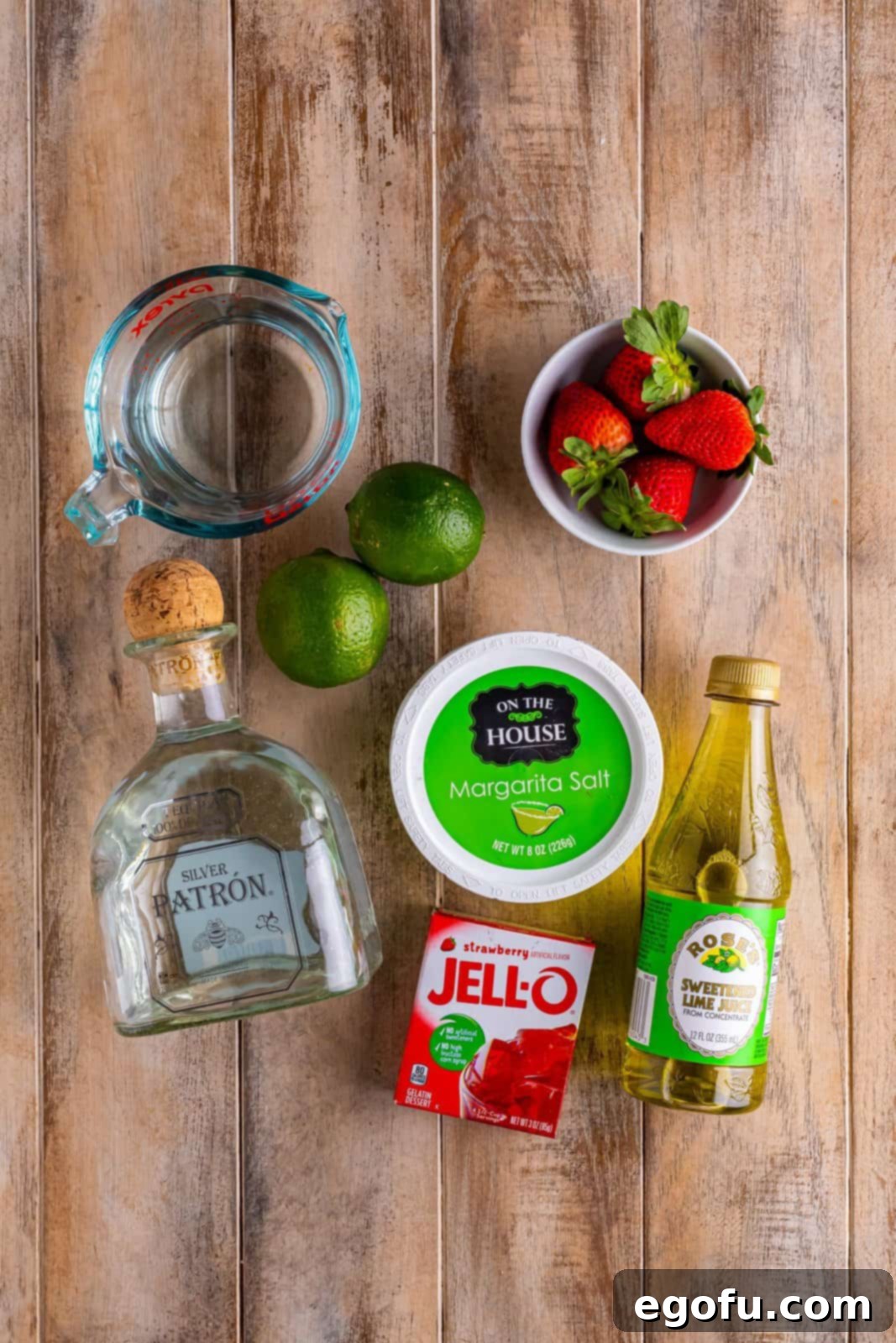 Strawberry Jell-O, strawberries, tequila, water, and lime juice.