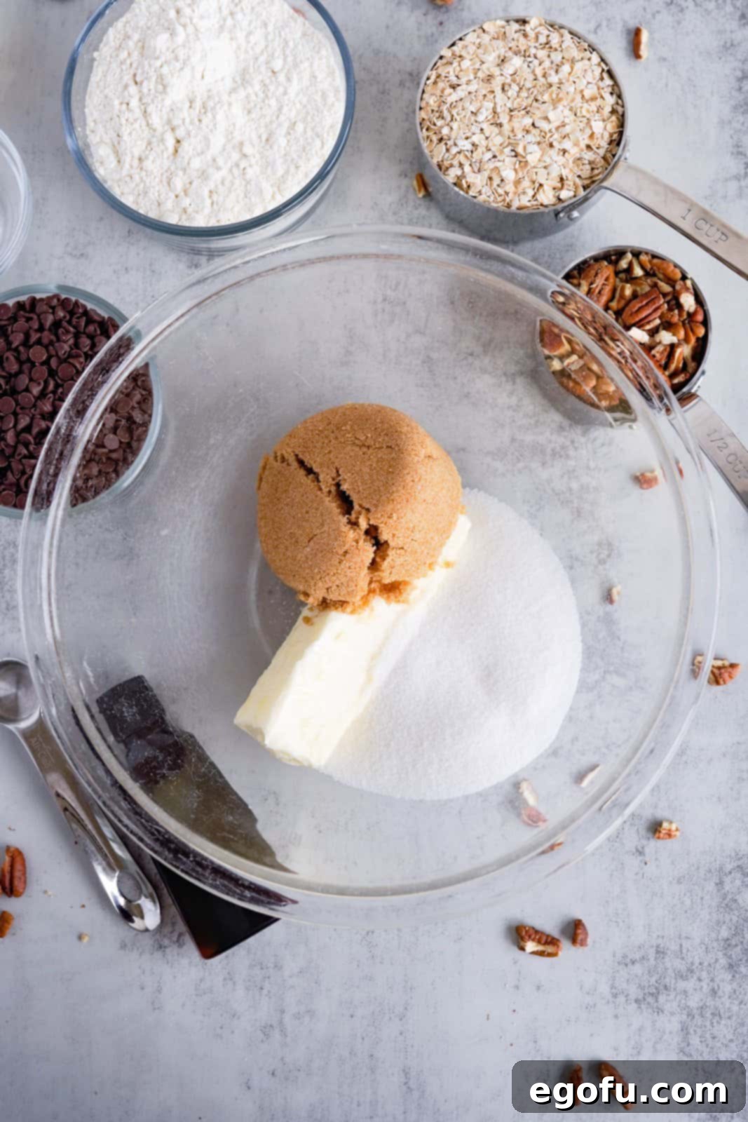 Oatmeal Chocolate Chip Delights 5 Creaming softened butter, granulated sugar, and brown sugar for oatmeal chocolate chip cookies until light and fluffy.
