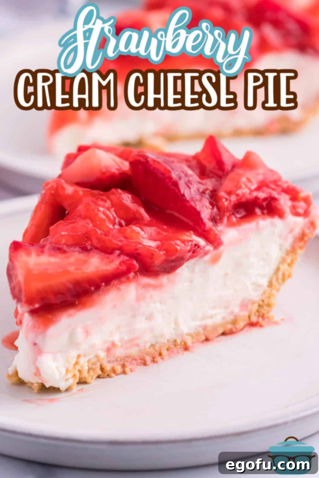 A perfect slice of Strawberry Cream Cheese Pie, showing its beautiful layers.