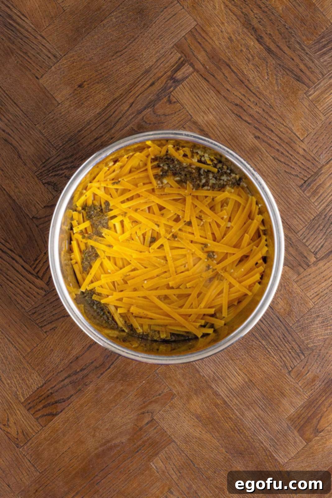 Broken fettuccini on top of other ingredients in the Instant POt.