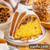 A slice of Sock It To Me Cake on a plate.