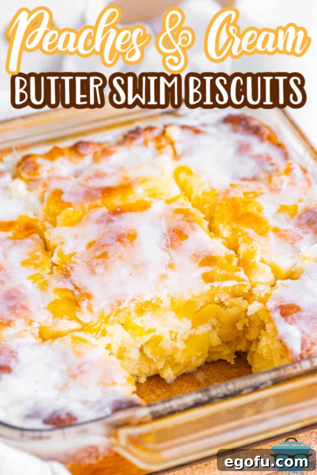 Sun-Kissed Peach Butter Swim Biscuits 3 A baking pan filled with golden-brown Peach Butter Swim Biscuits, fresh from the oven.