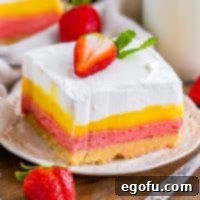 Layered Strawberry Bliss 15 A plate with a piece of Strawberry Lasagna.