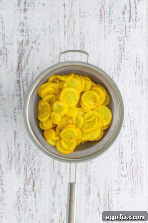 Squash in a colander.