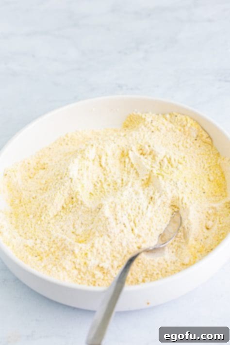 Golden Crispy Catfish 14 A mixing bowl with flour, cornmeal, and the leftover spice mix.