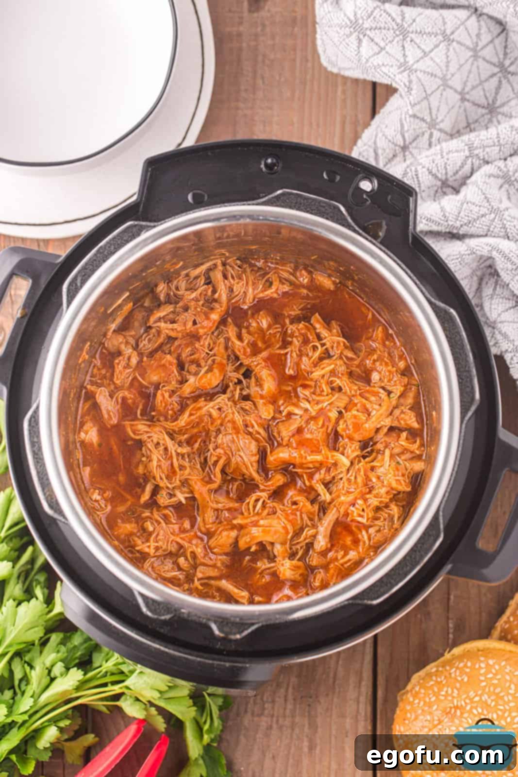 Looking down on an Instant Pot full of BBQ chicken.
