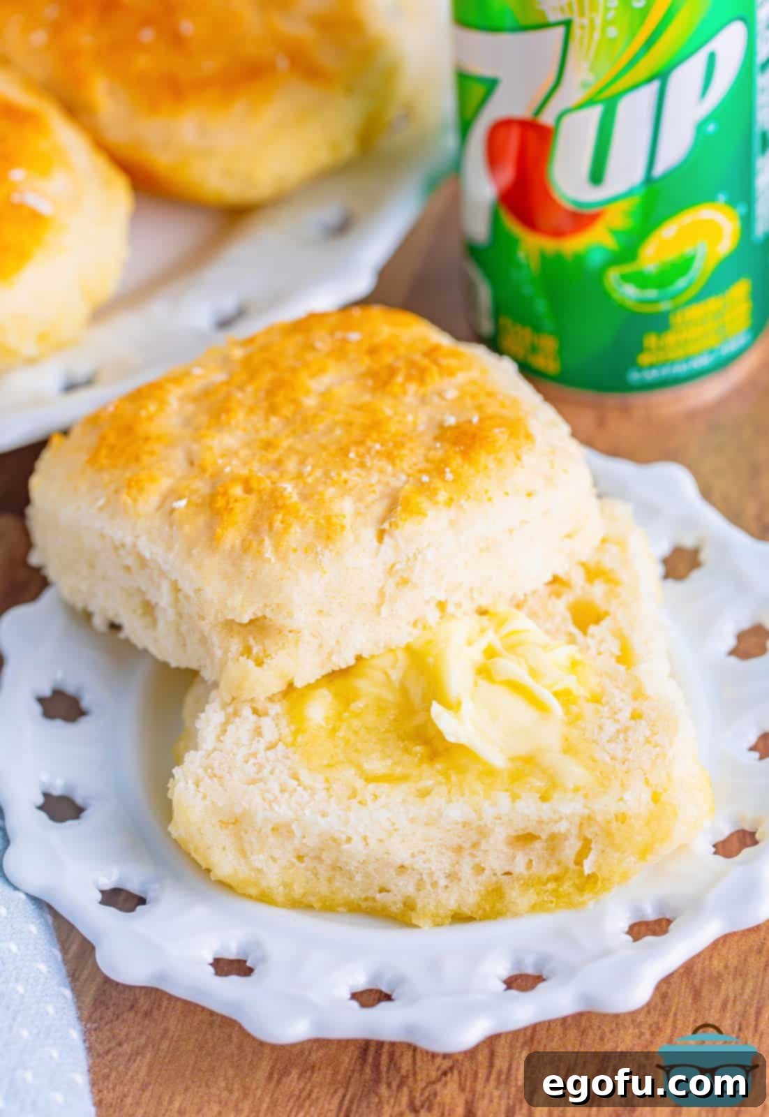 A rustic plate showcasing freshly baked 7Up Biscuits, ready to be enjoyed.
