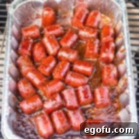 Looking down on a pan of Hot Dog Burnt Ends.