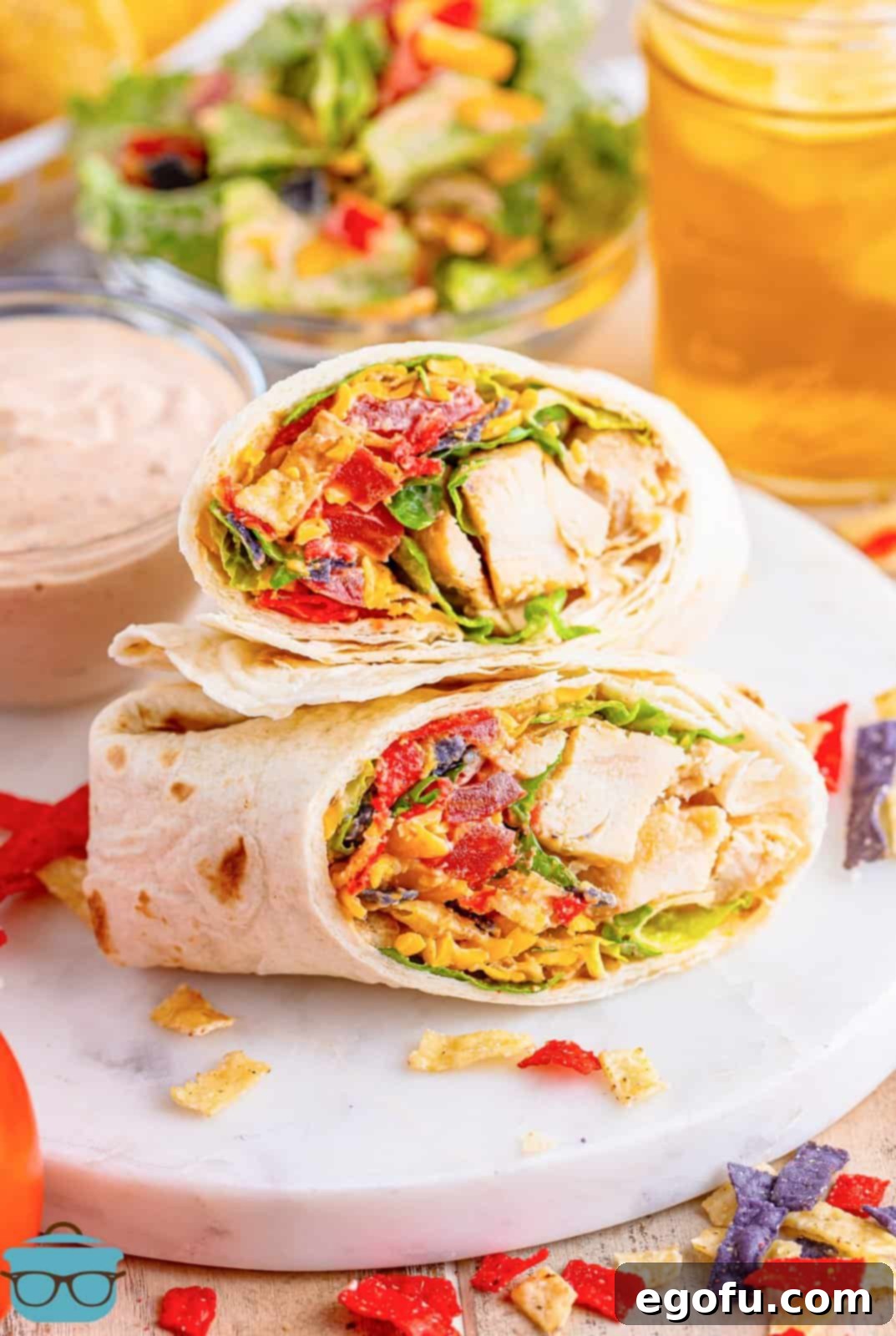 Stacked Southwest Chicken Wraps showcasing vibrant fillings, ready to be enjoyed.