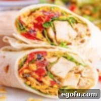 Two halves of Southwest Chicken Wraps laid on top of each other.