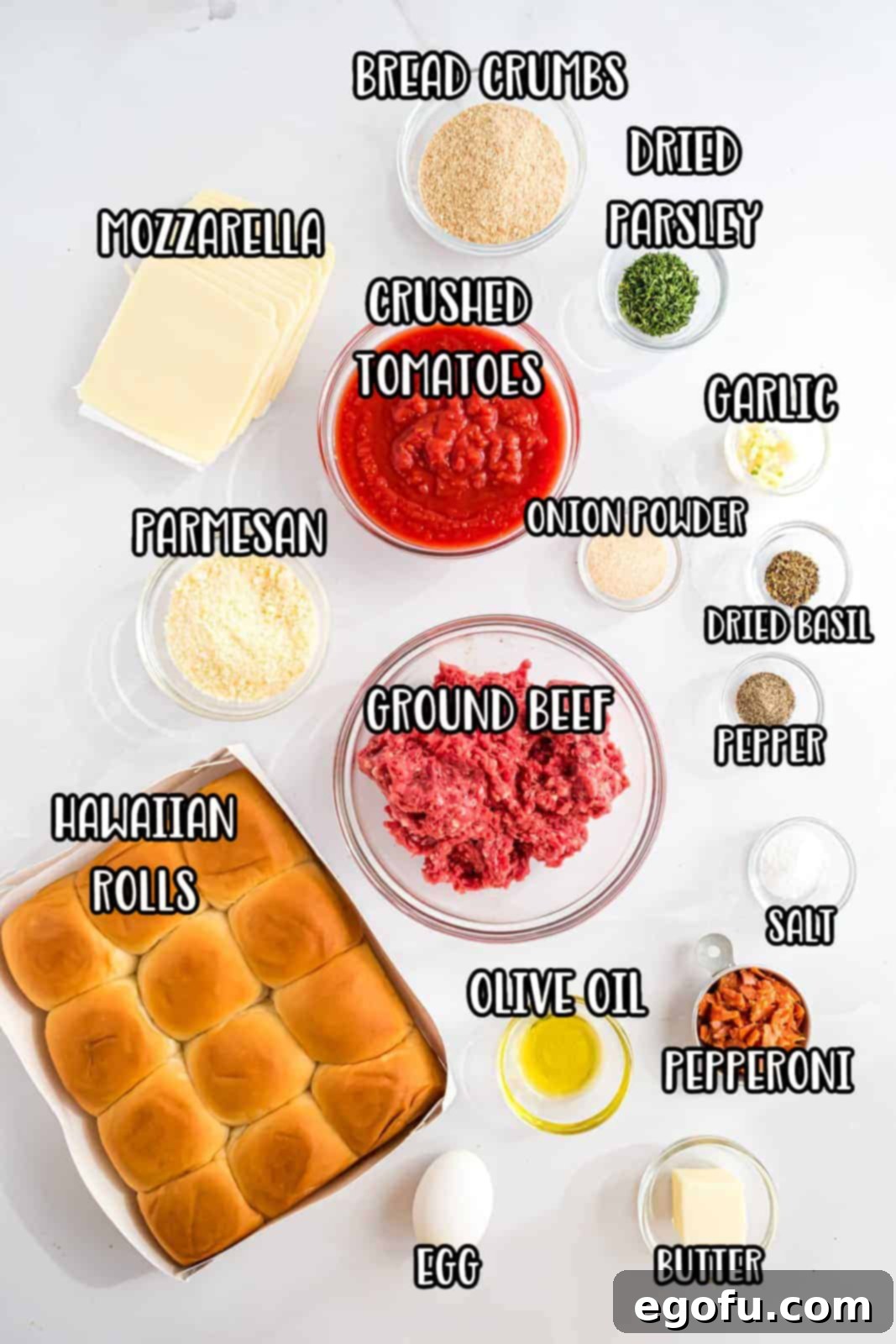 Ground beef, salt, pepper, onion powder, minced garlic, parsley flakes, egg, bread crumbs, parmesan cheese, olive oil, pepperoni, tomatoes, butter, and rolls. 
