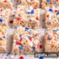 Star-Spangled Cereal Treats 8 Closely looking at a few 4th of July decorated Rice Krispie Treats.