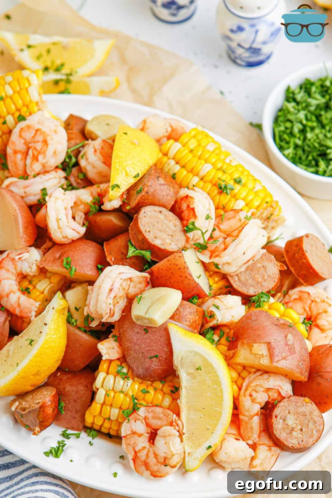 A serving platter with a bunch of Shrimp Boil.