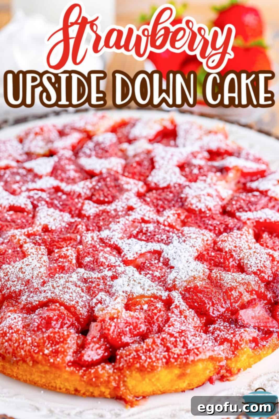 A stunning full Strawberry Upside Down Cake, beautifully inverted on a serving plate, showcasing its vibrant fruit topping.